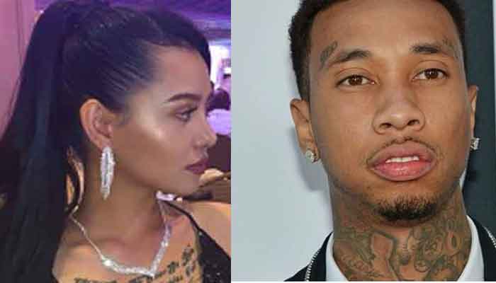 Tyga and Bella Poarch, the couple caught on camera in the parking lot